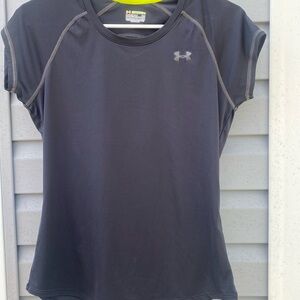 Women’s under armour semi-fitted shirt. Size medium